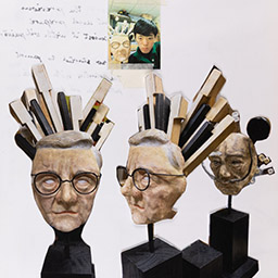 Close up of visual arts diary displaying progress images for a body of work